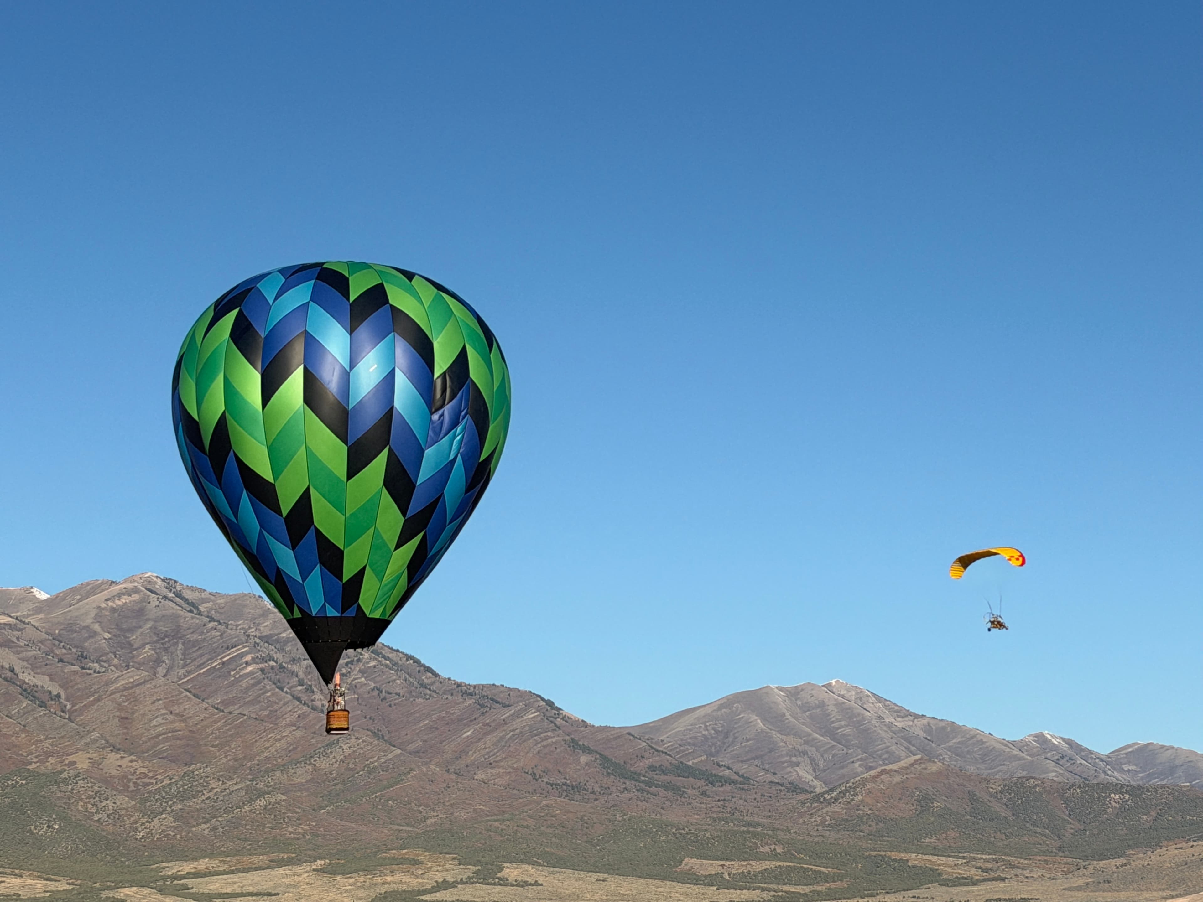 Hot air balloon over Utah landscape